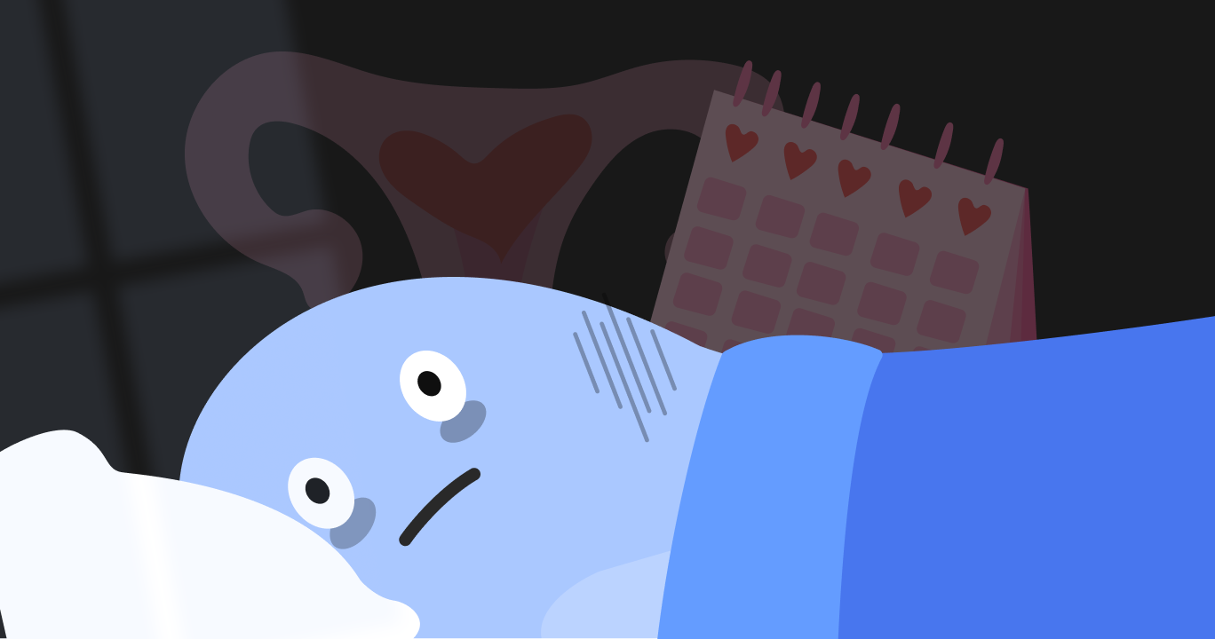 生理中の体の変化で眠れず、寝返りを打つ女性の姿