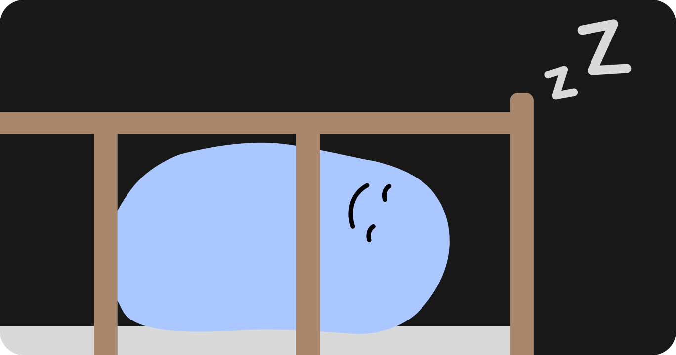 ベビーベッドで安らかに眠る赤ちゃん