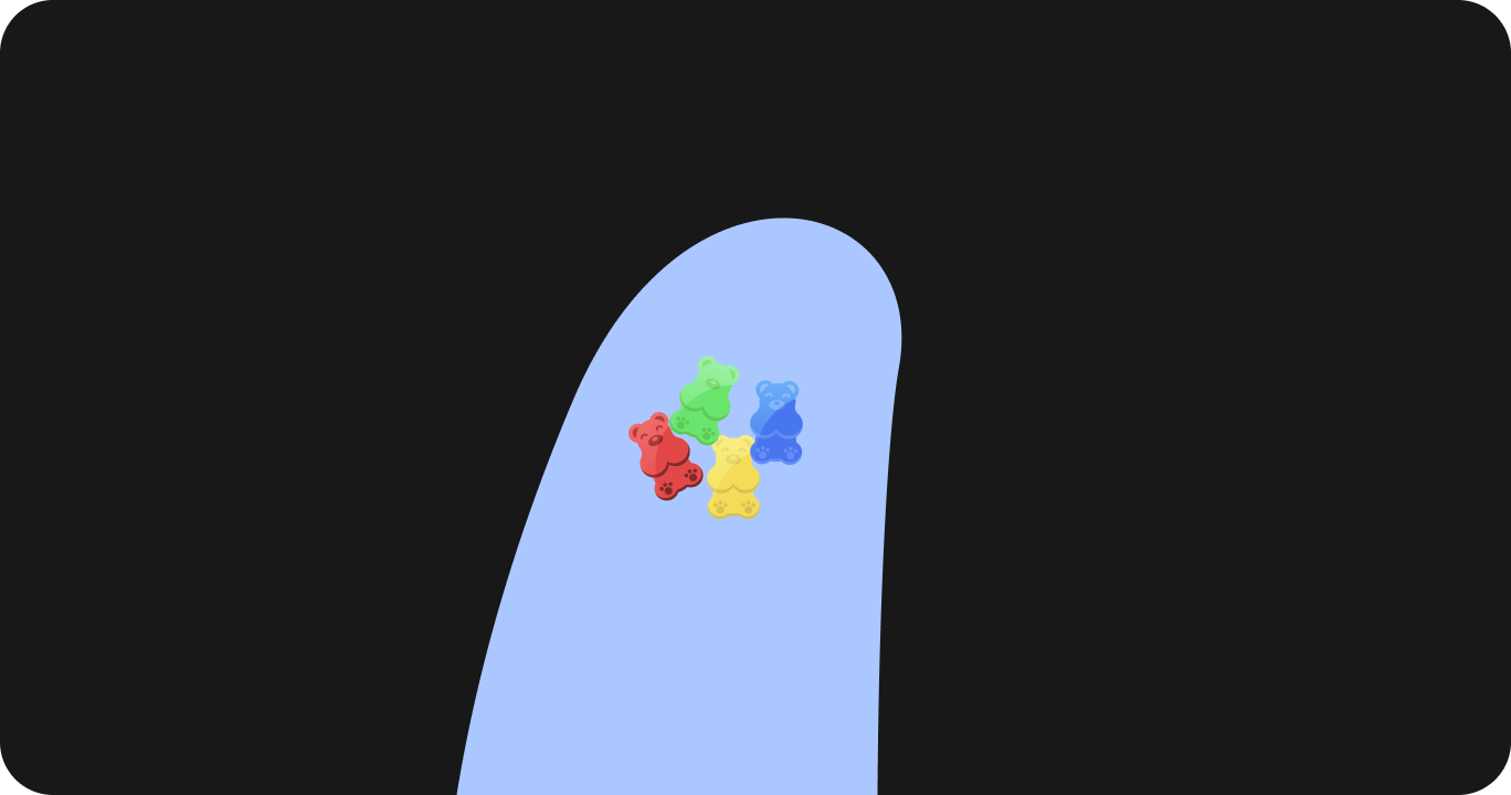 手のひらにのせたカラフルなグミサプリ